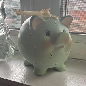 Green Piggy Bank with Floral Design